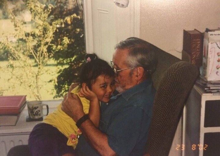 The author, as a child, with her grandpa