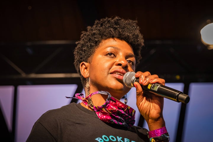 Cassia Herron introduces Kentucky Rep. Charles Booker, who was running for the state's Democratic Senate nomination, at a June event. 