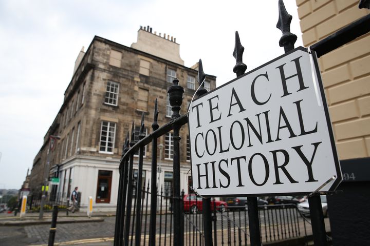 An imitation street sign that says 'Teach Colonial History' which has been erected in Dundas Street, Edinburgh, in the wake of the Black Lives Matter protests across the UK. (Photo by Andrew Milligan/PA Images via Getty Images)