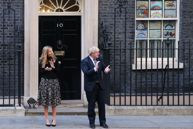 Boris Johnson applauding NHS workers in May