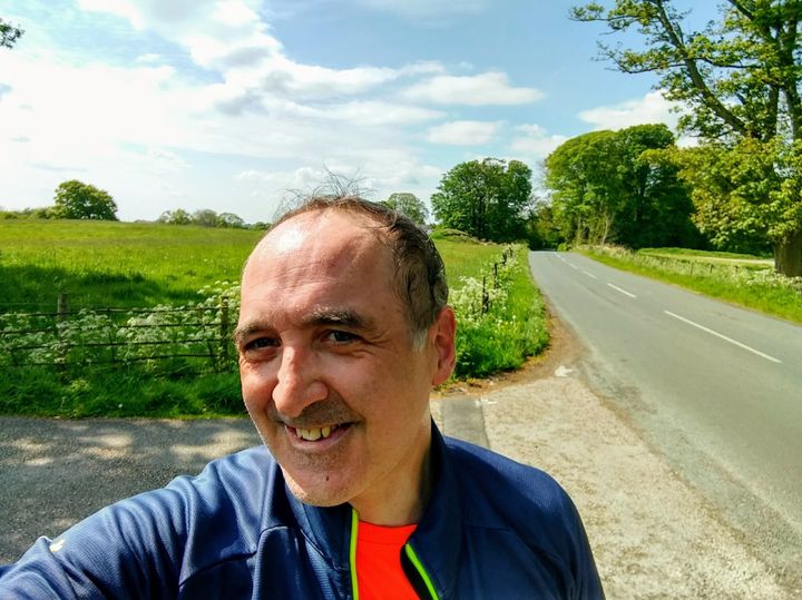 Keith Greaves cycling on country roads