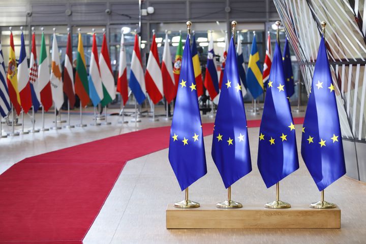 EU flags and flags of the European countries state member next to the red carpet where EU leaders arrive in the EU in the European Council building Forum Europa - Residence palace during the EU Leaders Summit. The national flags are the following : Austria, Italy, Belgium,Latvia, Bulgaria, Lithuania, Croatia, Luxembourg, Cyprus, Malta, Czechia, Netherlands, Denmark, Poland, Estonia, Portugal, Finland, Romania, France, Slovakia, Germany, Slovenia, Greece, Spain, Hungary, Sweden, Ireland, United Kingdom . Brussels 22 March 2019 (Photo by Nicolas Economou/NurPhoto via Getty Images)