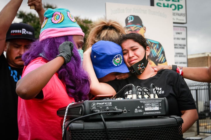Jennifer Guardado, sister of Andres Guardado, and other relatives of speak at a rally seeking justice for the 18-year-old on