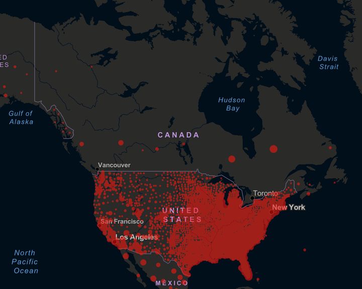 A map showing COVID-19 case rates in Canadian provinces and U.S. counties.