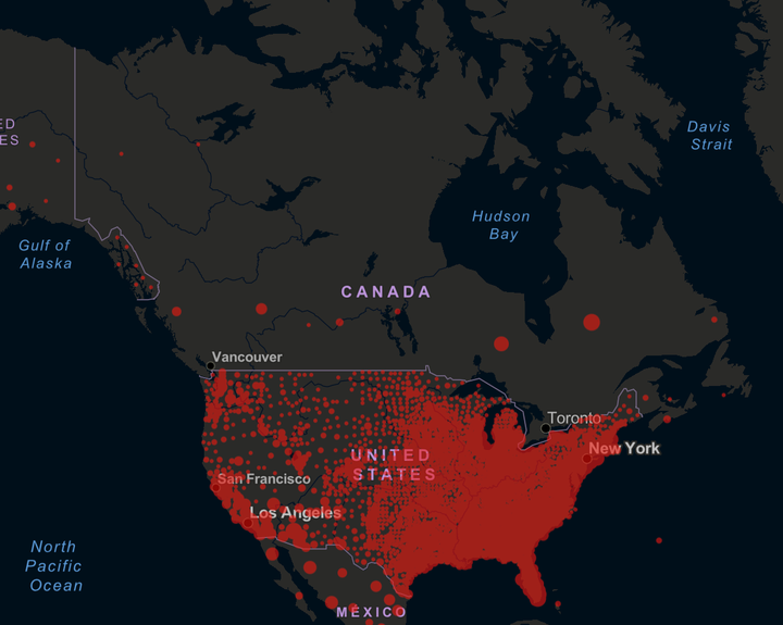 A map showing COVID-19 case rates in Canadian provinces and U.S. counties.