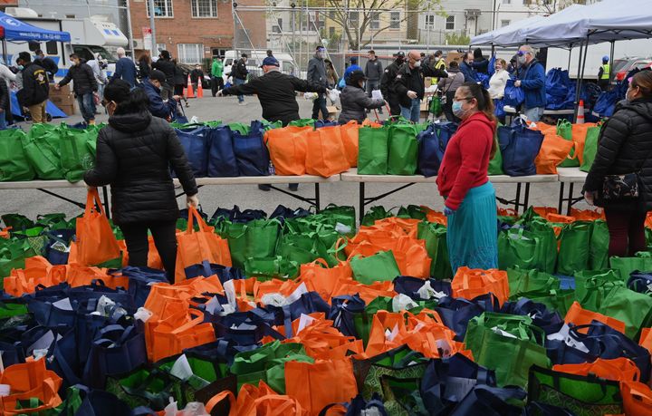 Catholic Charities host a pop-up food distribution site for community members impacted by the coronavirus pandemic on May 8, 2020 in the Brooklyn borough of New York City.