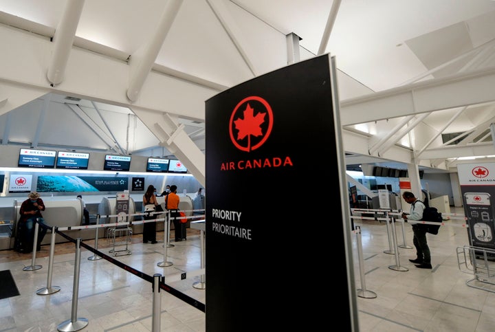 Air Canada hall at the Benito Juarez International airport, in Mexico City, on May 20, 2020. The airline has announced it will end its seat distancing policies on planes. 