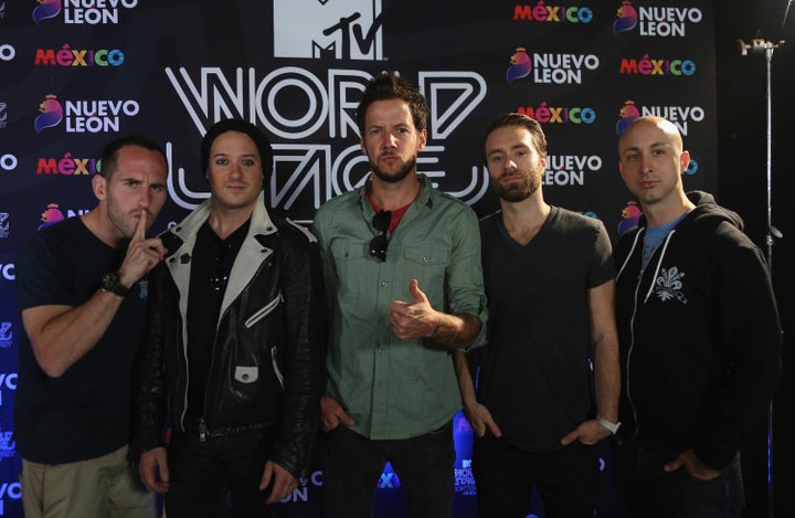 Chuck Comeau, David Desrosiers, Pierre Bouvier, Sebastien Lefebvre, and Jeff Stinco of Simple Plan attend a press conference during the MTV World Stage at Arena Monterrey on October 3, 2013 in Mexico.