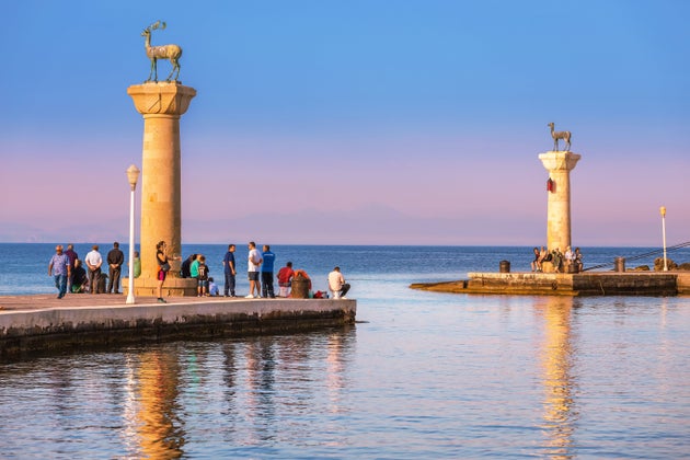27 May 2019, Rhodes, Greece: Famous tourist destination in Mandraki port with deers statue, where The Colossus was standing. Rhodes, Greece