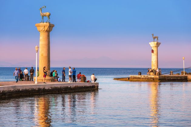 27 May 2019, Rhodes, Greece: Famous tourist destination in Mandraki port with deers statue, where The Colossus was standing. Rhodes, Greece