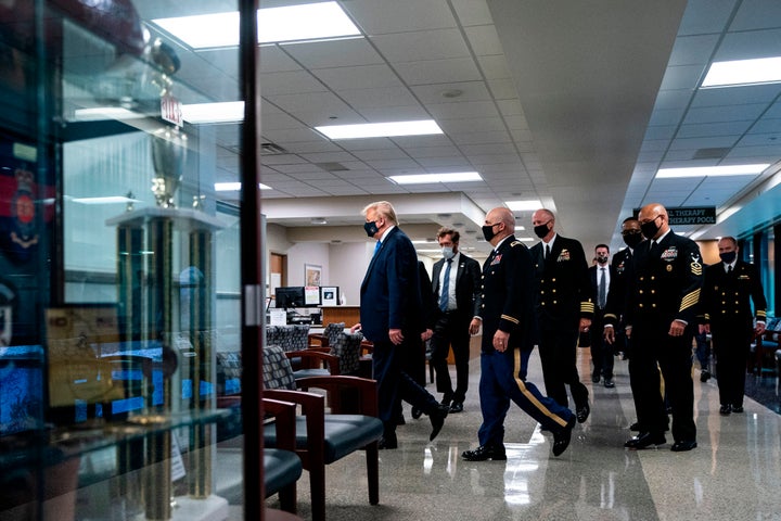 US President Donald Trump wears a mask as he visits Walter Reed National Military Medical Center in Bethesda, Maryland' on July 11, 2020. (Photo by ALEX EDELMAN / AFP) (Photo by ALEX EDELMAN/AFP via Getty Images)