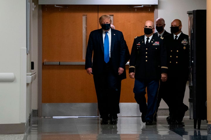 US President Donald Trump wears a mask as he visits Walter Reed National Military Medical Center in Bethesda, Maryland' on July 11, 2020. (Photo by ALEX EDELMAN / AFP) (Photo by ALEX EDELMAN/AFP via Getty Images)