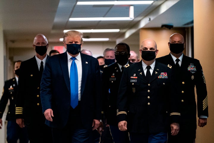 US President Donald Trump wears a mask as he visits Walter Reed National Military Medical Center in Bethesda, Maryland' on July 11, 2020. (Photo by ALEX EDELMAN / AFP) (Photo by ALEX EDELMAN/AFP via Getty Images)