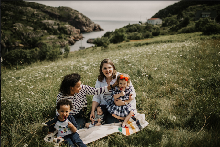 Megan, left, and Katie with their three kids: Duke, Poppy, and baby Dermott.