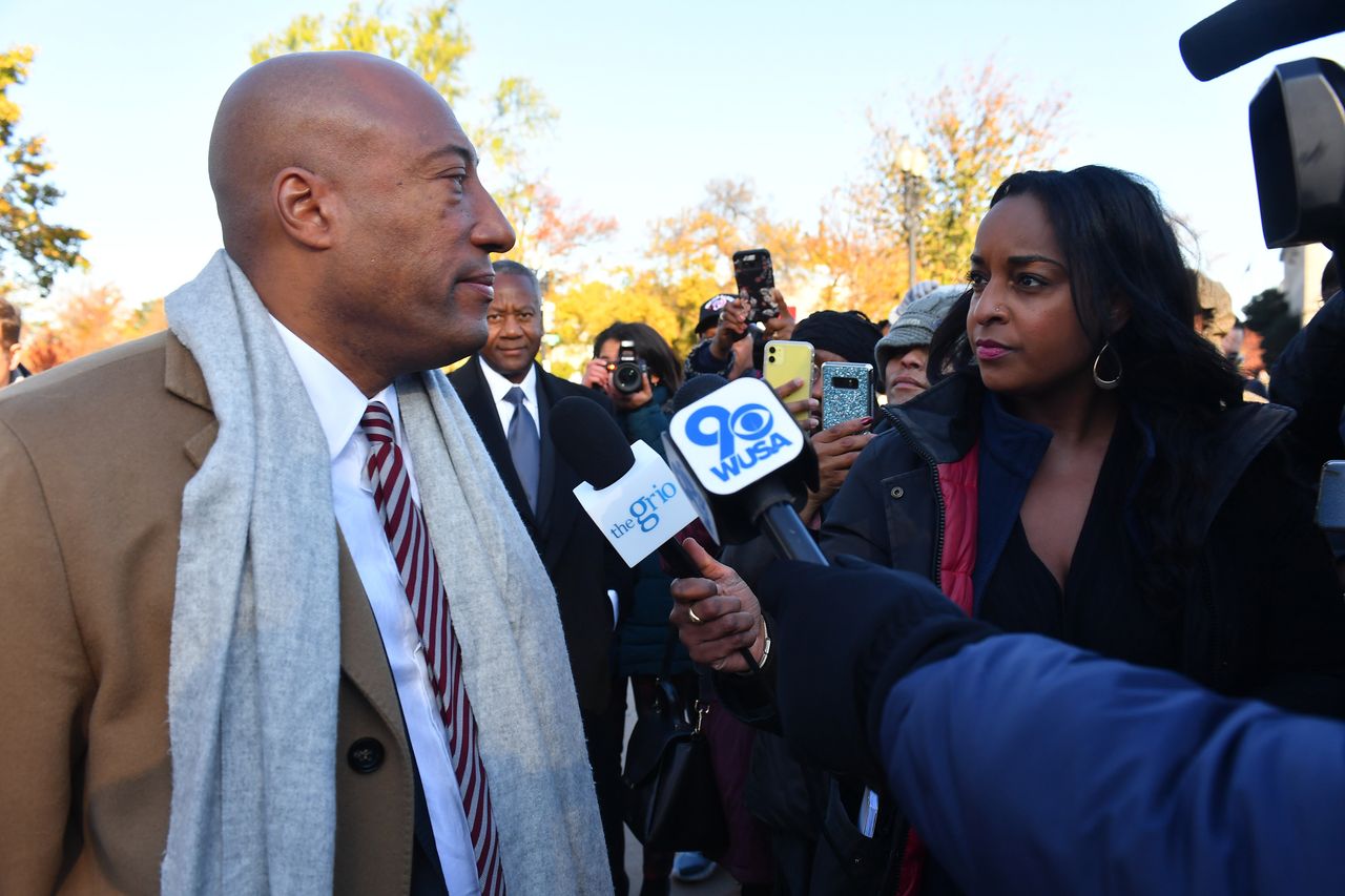Natasha Alford (right) and TheGrio owner Byron Allen, in front of the Supreme Court in November 2019.