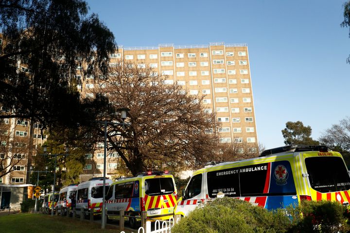 Ambulances line up outside the North Melbourne Public Housing tower complex last week.