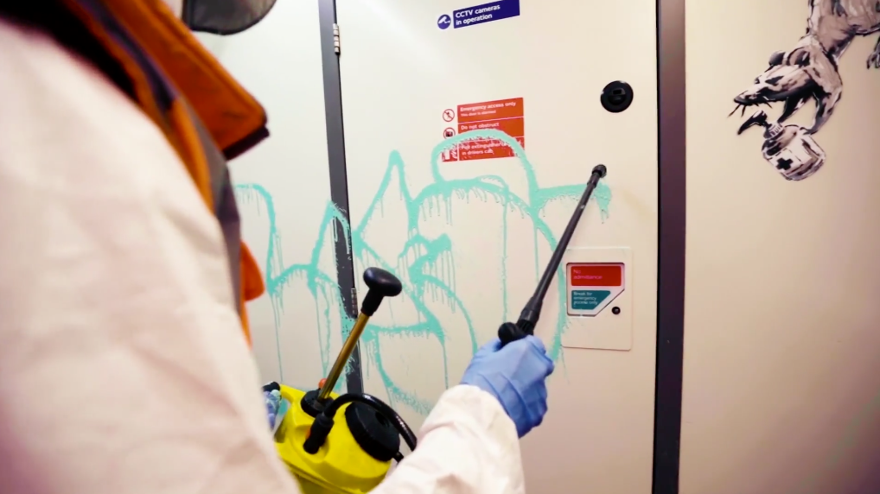 Banksy Filmed Spreading COVID-19 Message All Over Train In London’s Underground