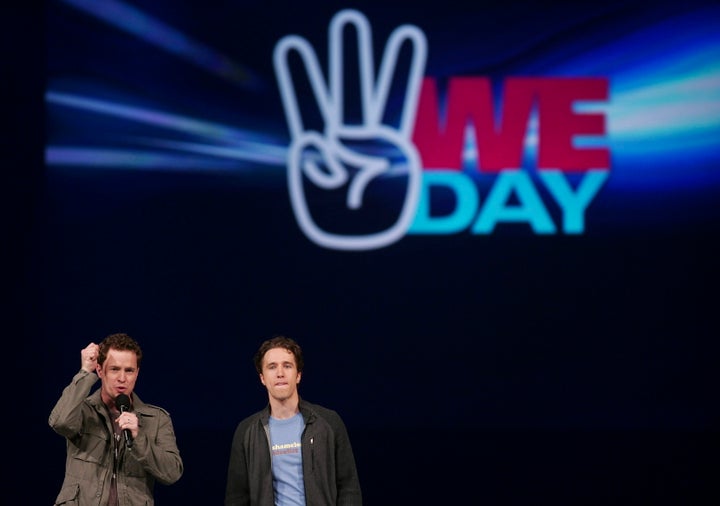 Marc, left, and Craig Kielburger, co-founders of the charity Free the Children, speaks at the charity's We Day celebrations in Kitchener, Ontario, Thursday, February 17, 2011. 