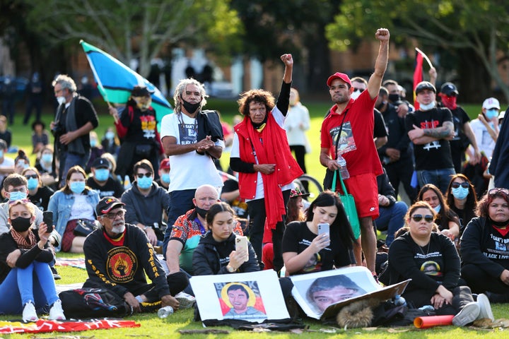 Leetona Dungay raises her fist in the air during a rally on July 5, 2020, in Sydney.