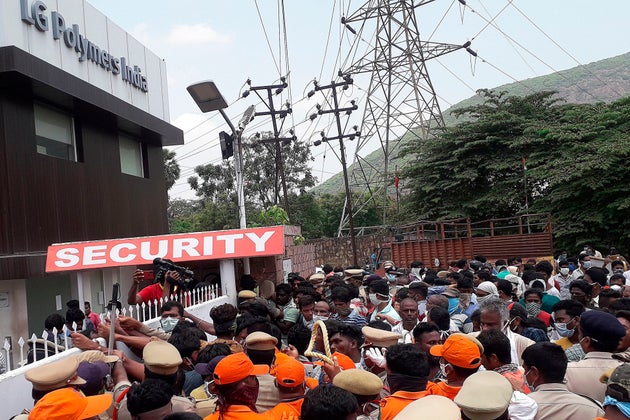 Residents protest in front of LG Polymers plant demanding justice to the gas leak victims, in Visakhapatnam,...
