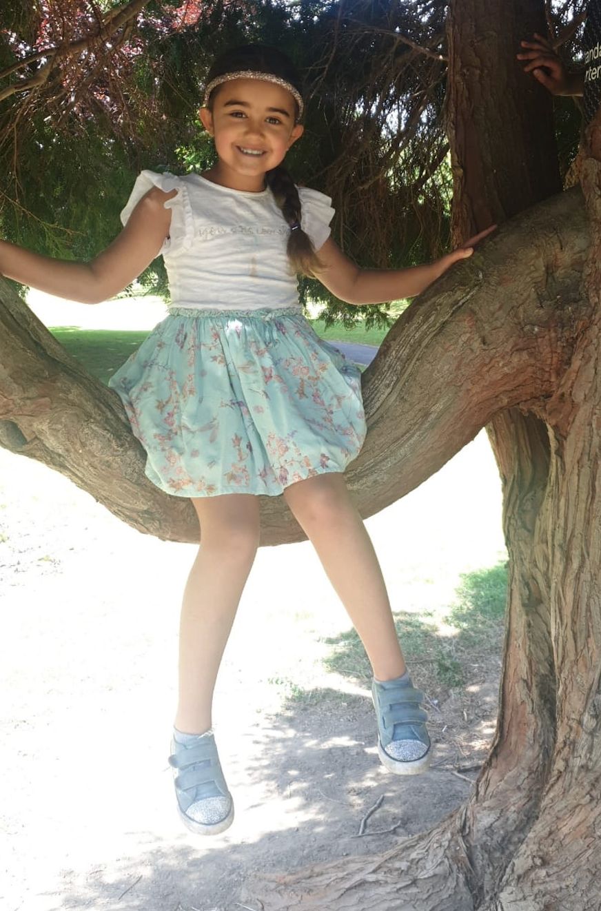 Terri-Anne's daughter Amayah, six, enjoying climbing tree