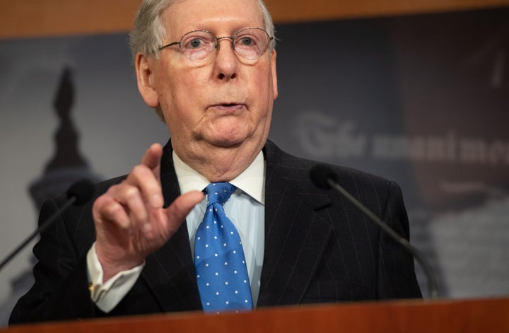 Senate Majority Leader Mitch McConnell faces Democrat Amy McGrath in Kentucky's November election. Here, McConnell holds a pr