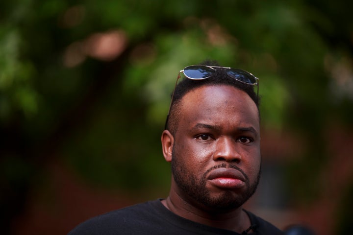 Vauhxx Booker speaks during a press conference at Peoples Park in Bloomington. 
