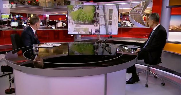 Chinese ambassador to the UK Liu Xiaoming being shown footage by the BBC's Andrew Marr.