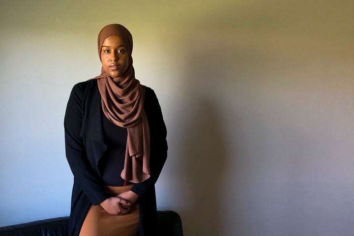Asmaa Ali is photographed at home in Edmonton on Friday. She is the co-creator, along with her friend Habon Ali, of a Canada-wide comprehensive list of resources for survivors of sexual assault. This image was directed remotely while Aisha Ali operated the camera, because of COVID-19 related restrictions.