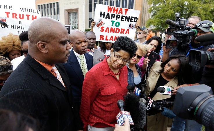 Sandra Bland’s mother, Geneva Reed-Veal, talks with reporters in March 2016 after an arraignment hearing for former Texas state trooper Brian Encinia, who had pulled Bland over in July 2015 for not signaling. Bland — who had depression and epilepsy — was arrested, couldn’t make bail, and three days later was found hanged in her jail cell. A perjury charge against Encinia was dropped in 2017 despite the evidence from a recording of their exchange.