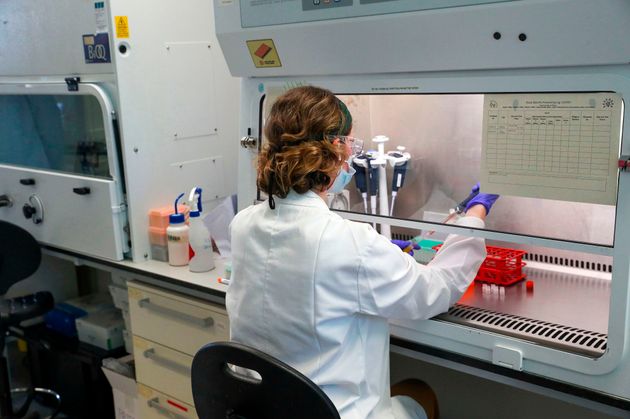 A scientist at Oxford Vaccine Group's laboratory facility at the Churchill Hospital in Oxford.