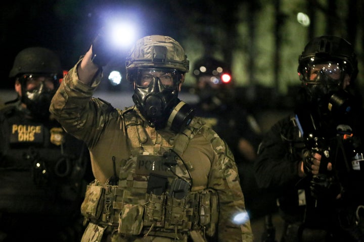 Militarized federal agents deployed by the president fired tear gas at protesters during a demonstration in Portland, Oregon,