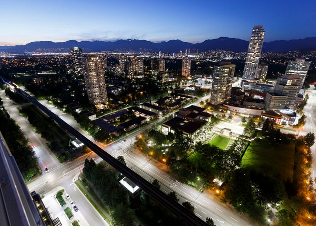 A view of Metro Vancouver is seen here at twilight on July 18, 2020, from Burnaby, B.C. Softening...