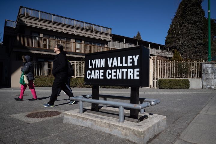Workers arrive at the Lynn Valley Care Centre in North Vancouver on March 14, 2020. 