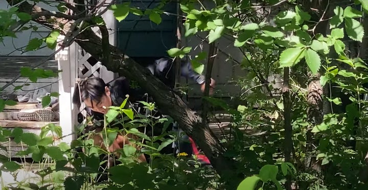 A Saskatoon police officer uses force to apprehend a man in this image taken from a YouTube video posted by the group Justice For Evan Penner on July 6, 2020.