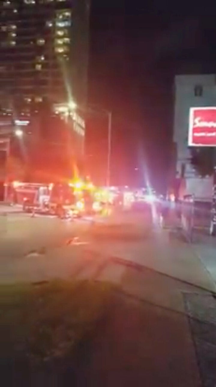 Fire trucks are seen outside the Chinese consulate, where local media reported trash cans filled with documents are being burned in the courtyard, in Houston, Texas, on July 21, 2020, in this still image taken from video obtained from social media.