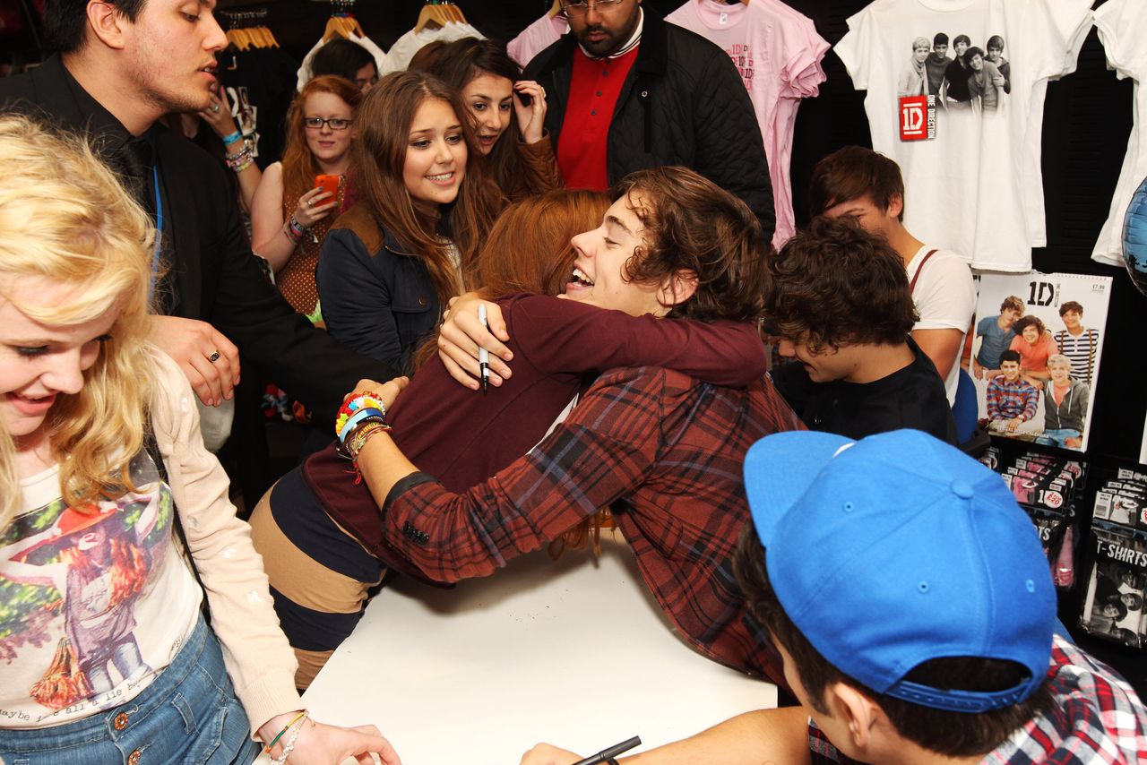 One Direction meet fans at an album signing