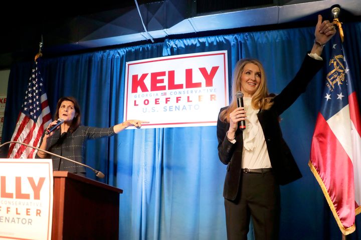 Sen. Kelly Loeffler, seen here at a campaign rally in March with former U.N. Ambassador Nikki Haley, warns that supporting th