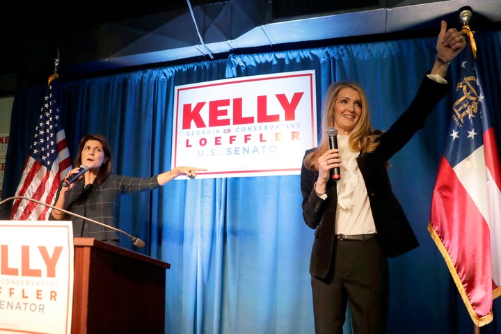 Loeffler, seen here at a campaign rally in March with former U.N. Ambassador Nikki Haley, warns that supporting the Black Liv