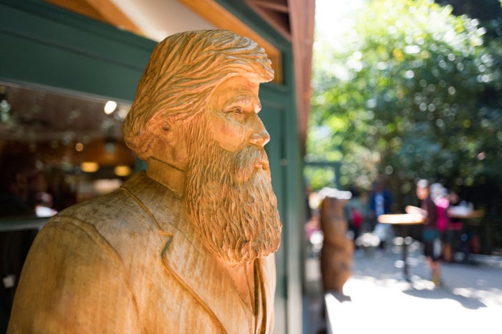 A carved, wooden statue of John Muir, who founded the Sierra Club, at Muir Woods National Monument, Mill Valley, California.