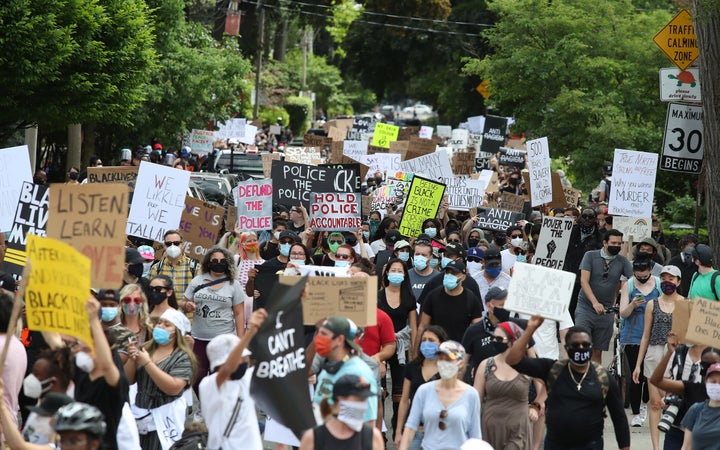 A peaceful march for Black Lives Matter in early June, following the deaths of George Floyd and Regis Korchinski-Paquet.