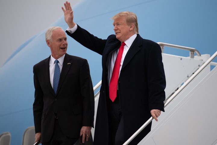 President Donald Trump and Sen. Ron Johnson (R-Wis.) leave Air Force One upon arrival in Green Bay, Wisconsin, on April 27, 2019, before a Trump campaign rally.