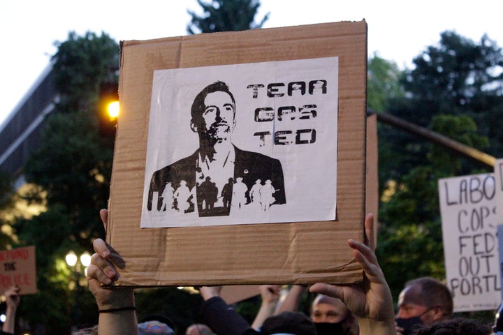 Ted Wheeler on Wednesday faced a hostile crowd of protesters, who sharply questioned him as he tried to rally demonstrators w