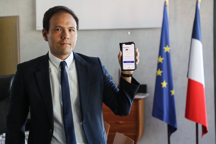 Cedric O, France's junior minister for digital affairs, presents the StopCovid contact tracing app at his office in Paris on May 29, 2020.