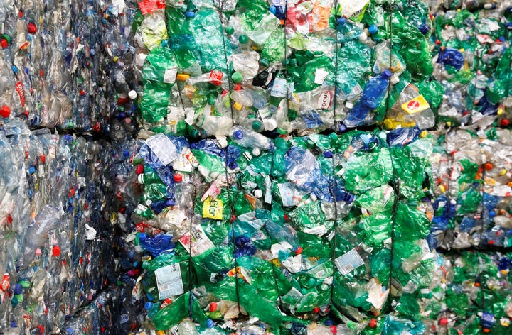 Bundles of pressed plastic bottles at the Transcycle Transport & Recycling AG company in Neuenhof, Switzerland. A very small percentage of plastic is recycled; most ends up in a landfill or polluting waterways.