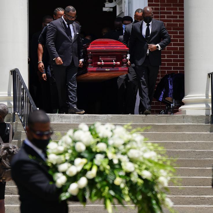 ATLANTA, GA - JULY 23: The casket holding the body of civil rights icon C.T. Vivian is carried out of Providence Missionary Baptist Church following his funeral service on July 23, 2020 in Atlanta, Georgia. Vivian, a close associate and friend of Martin Luther King Jr. was a renowned preacher who participated in the Freedom Rides and helped organize non-violent protest in the South during the 1960s. (Photo by Elijah Nouvelage/Getty Images)