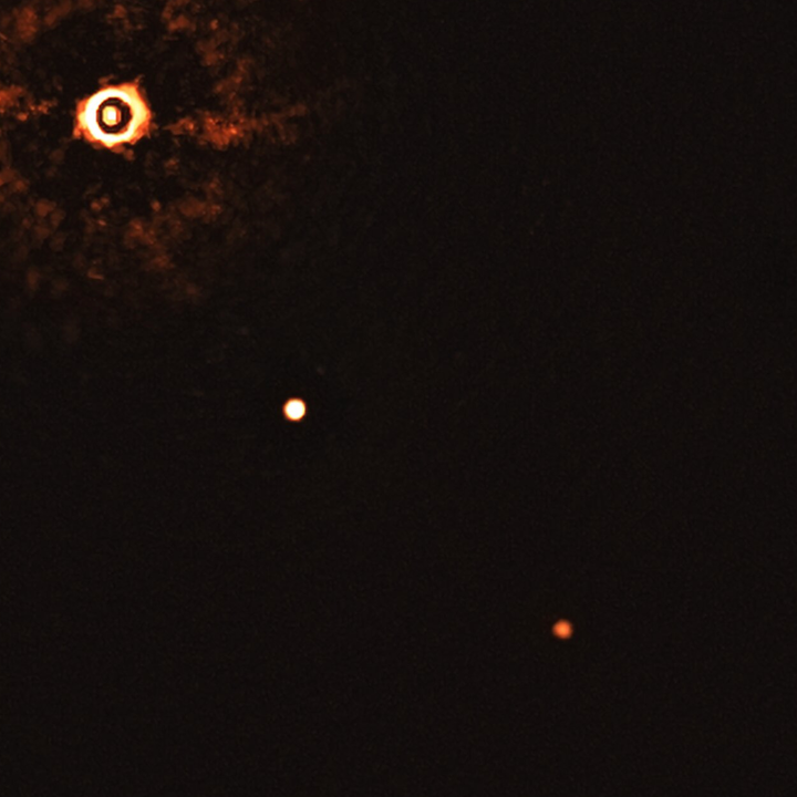 A zoomed-in view of star TYC 8998-760-1 and its two exoplanets.