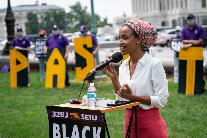 Rep. Ilhan Omar (D-Minn.) speaks at a union-sponsored Black Lives Matter rally in Washington on July 20. She is backed by a host of labor unions.