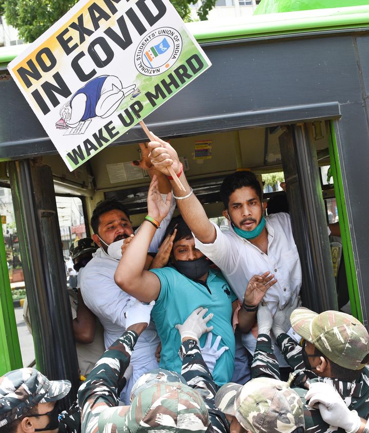 NSUI workers are detained after a protest demanding the cancellation of final year exams and promotion of students on the basis of past performance, ou HRtsideD Ministry at Shastri Bhawan, on July 21, 2020 in New Delhi.