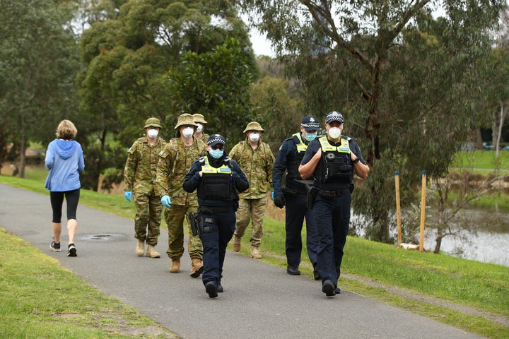 MELBOURNE, AUSTRALIA - JULY 23: Police and the Australian military patrol the banks of the Yarra River on July 23, 2020 in Melbourne, Australia. 